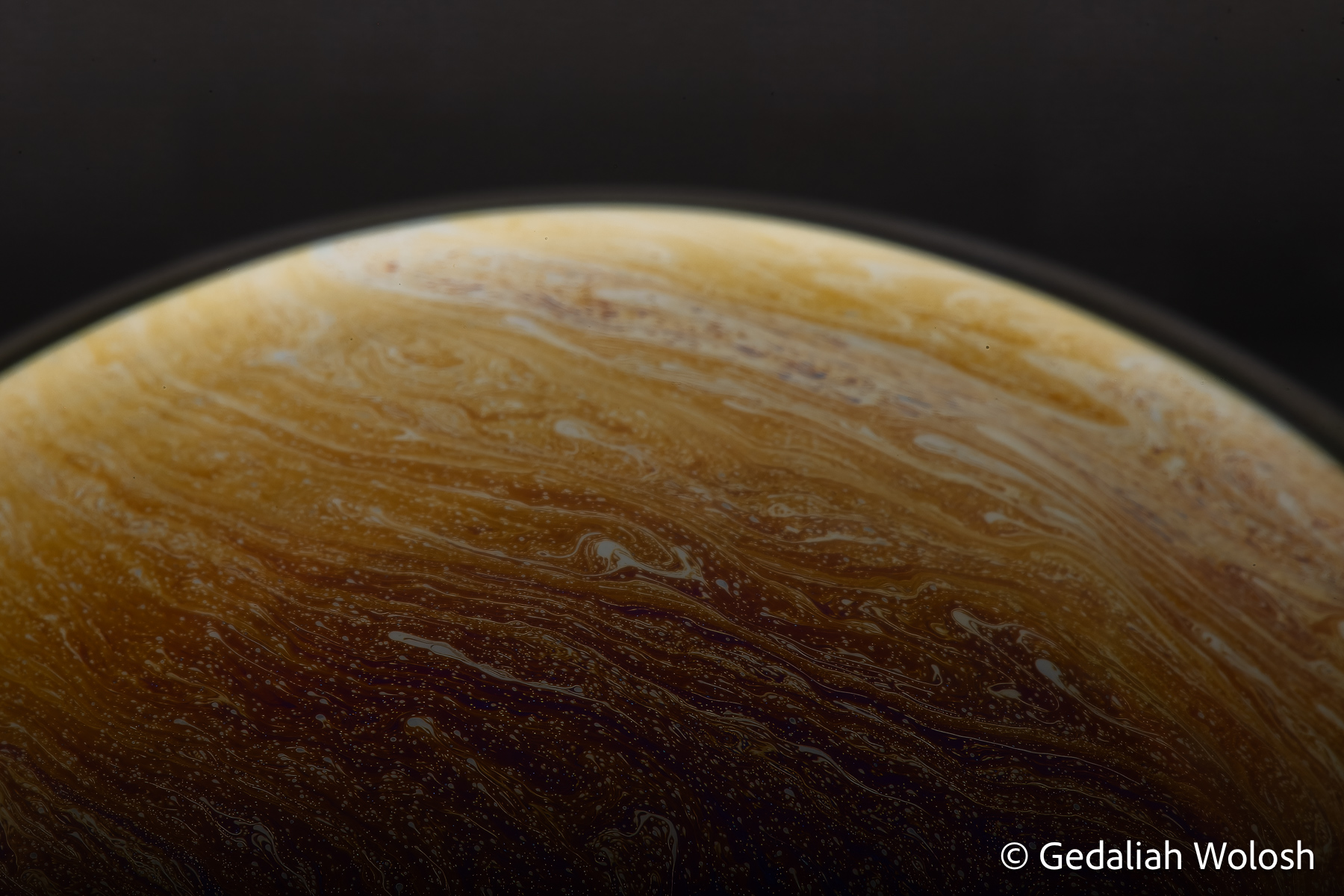 Jovian Horizon Bands of interference color and fluid flow create a structure reminiscent of the atmosphere of Jupiter. The image records a transient...