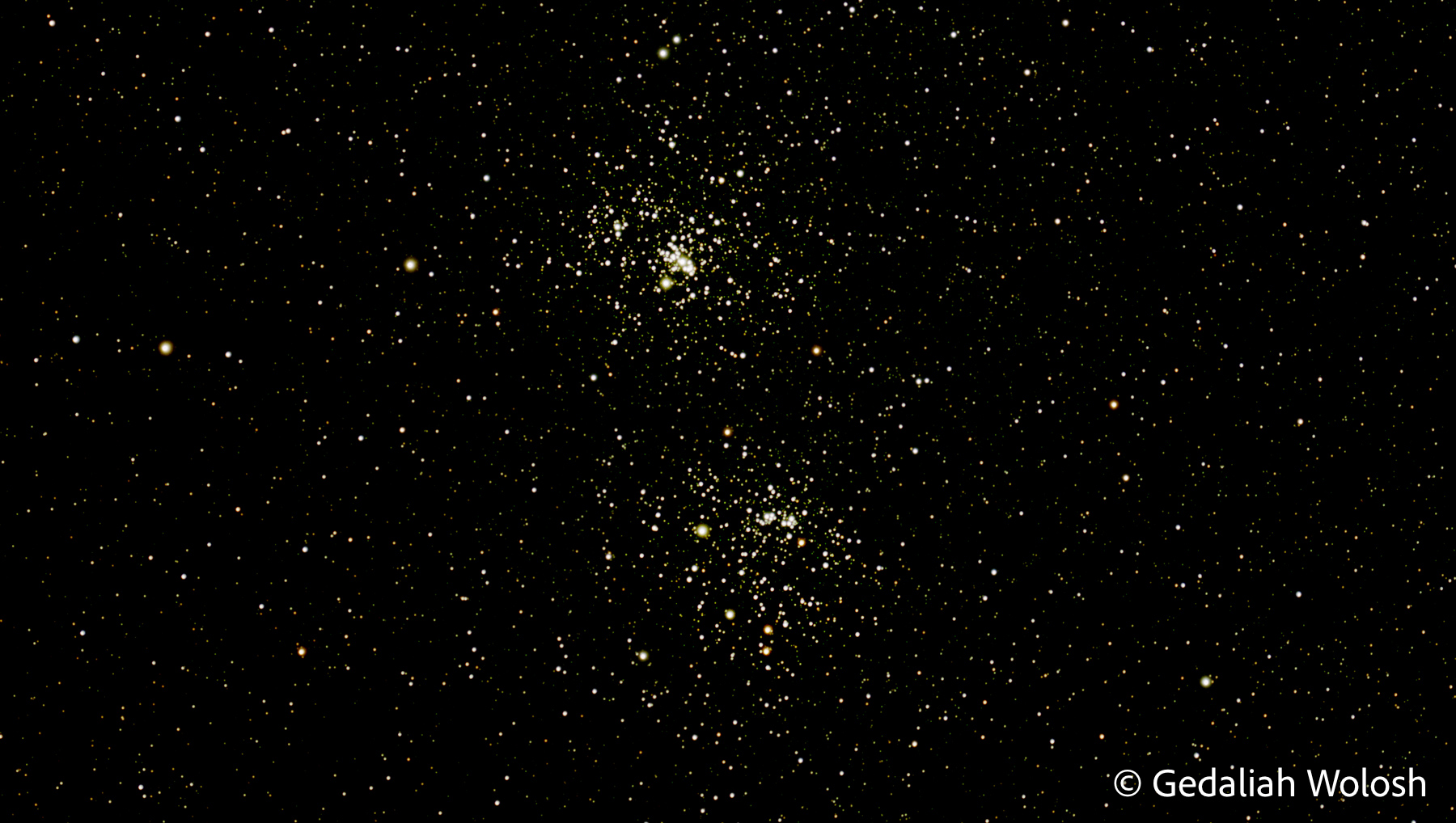Double Cluster (NGC 869 and NGC 884 ) Two neighboring open star clusters suspended within the rich star fields of Perseus. Though they appear close together in the...
